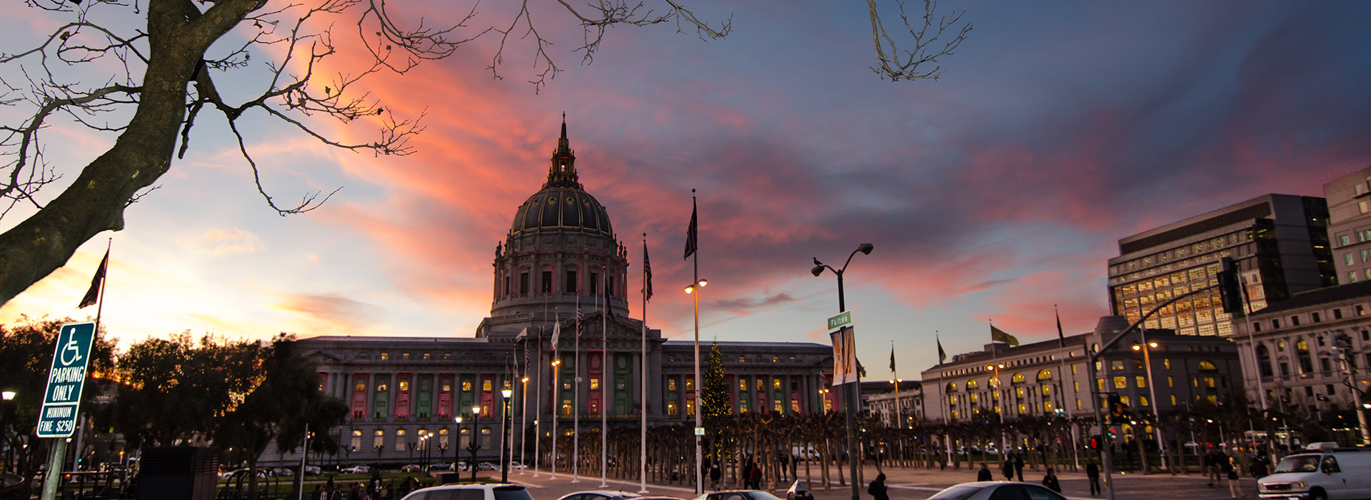 Sunset over a grand historic building.